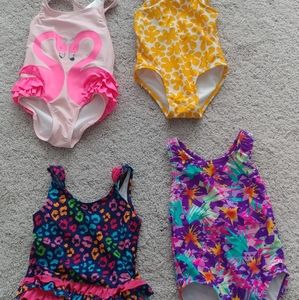 Four bathing suits (sizes 2T and 3T)